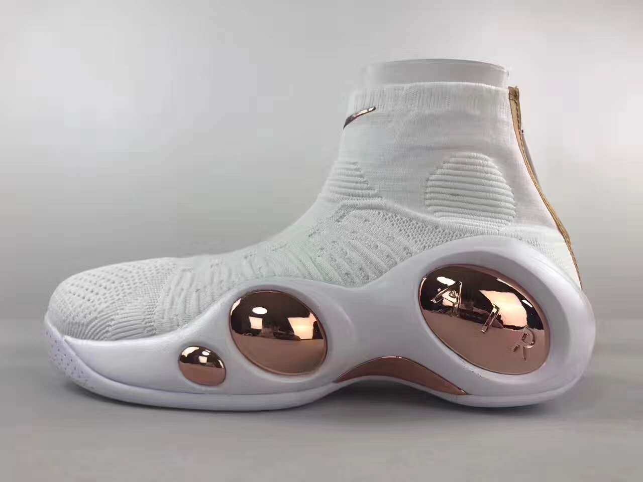 gold and white nike sneakers